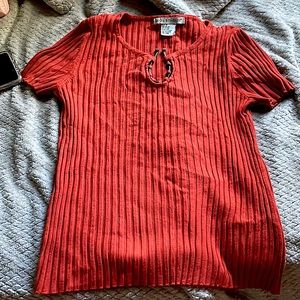 Reddish orange shirt